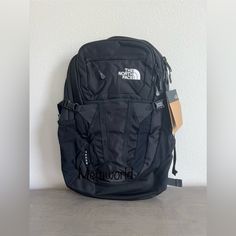 New Black One Size Unisex Backpack Outfit Men, The North Face Backpack Black, The North Face Black Backpack For Outdoor Activities, Black Nylon Backpack By The North Face, The North Face Recon Backpack, Black Hiking Bags With Functional Pockets, The North Face Black Backpack For Travel, The North Face Black Nylon Backpack, Black Waterproof Bags For Hiking