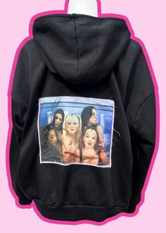 Embrace the spirit of Girl Power with this unisex fit black fleece-lined hoodie. Each hoodie is handmade with care and attention to detail, adorned with personalized printed patches meticulously stitched.  In the 1990s, the Spice Girls took the world by storm with their catchy tunes and empowering message of Girl Power. One fun fact about the group is that their nicknames--Scary, Sporty, Baby, Ginger, and Posh--were originally given to them by a British pop magazine. These nicknames quickly beca Black Y2k Cotton Sweatshirt, Black Cotton Y2k Sweatshirt, Y2k Style Relaxed Fit Winter Sweatshirt, Hip Hop Cotton Hoodie For Alternative Fashion, Oversized Graphic Hoodie For Alternative Fashion, Oversized Graphic Print Hoodie For Alternative Fashion, Y2k Black Cotton Hoodie, Black Cotton Y2k Hoodie, Hip Hop Cotton Hoodie For Concert