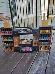 an old wooden box with many bottles on it