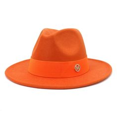 This elegant women fedora hat is sure to turn heads. Crafted of cotton, its all-season design ensures lasting wear and comfort. With its timeless style and solid pattern, this hat is an ideal choice for a casual, fashionable look. Luxury Brands Shopping, Fedora Hats For Women, Fedora Hat Style, Fedora Fashion, Womens Fedora Hat, Orange Hat, Womens Tweed Jacket, Womens Fedora, Wool Fedora Hat