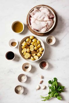 ingredients for chicken stew laid out on a table