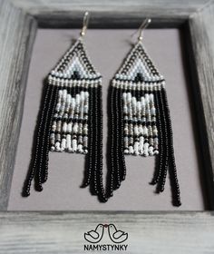 These gray and black fringe beaded earrings are made of high-quality Czech beads and strong synthetic thread. They are elegant, fashionable, and highly versatile, suitable for everyday wear. Features: Sterling silver components Color: gray, white, black. This item is currently in stock. You must be completely satisfied. If you find merchandise unsatisfactory for any reason, return it within 10 days and your money will be refunded without questions. These earrings in gold color https://www.etsy.c Black Bohemian Dangle Tassel Earrings, Black Tassel Earrings With Colorful Beads For Gift, Handmade Black Tassel Drop Earrings, Black Dangle Tassel Earrings With Beads, Black Beaded Bohemian Tassel Earrings, Black Fringe Dangle Chandelier Earrings, Black Bohemian Tassel Earrings With Round Beads, Bohemian Black Tassel Earrings With Round Beads, Bohemian Black Tassel Earrings With Dangling Beads