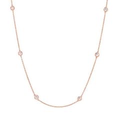 Metal Type: 14K Rose Gold Metal Weight: 3.42 grams Diamond Carat Weight: 0.5 carats Diamond Setting: Bezel Setting Number of Diamonds: 10 round diamonds Necklace Length: 18 inches This stunning necklace is crafted in 14K rose gold with a gross weight of 3.42 grams. The necklace features ten round diamonds, each securely set in a bezel setting. The bezel setting not only enhances the visual appeal of the diamonds but also ensures their protection. With a length of 18 inches, this necklace is desi Classic Rose Gold Cubic Zirconia Diamond Necklace, Dazzling Rose Gold Diamond Necklace With 17 Jewels, Classic Round Rose Gold Diamond Necklace, Round Rose Gold Diamond Necklace, Rose Gold Round Brilliant Cut Diamond Necklace, Classic Rose Gold Cubic Zirconia Necklace, Classic Rose Gold Round Diamond Necklace, Classic Rose Gold Cubic Zirconia Necklaces, Round Rose Gold Diamond Necklace In Fine Jewelry Style