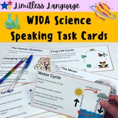 a person holding up some cards with writing on them and the words wida science speaking task cards