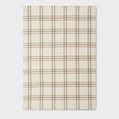 a white and brown plaid fabric