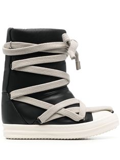 Jumbo Puffer mega-laced sneaker boots from Rick Owens featuring black, calf leather, padded design, ankle-length, rubber toecap and wide laces. Rick Owens Boots, Rick Owens Shoes, Lace Sneakers, Moon Boots, Dream Shoes, Mid Calf Boots, Lace Boots, Rick Owens, Wedge Sneaker