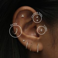 three different types of ear piercings on the side of a woman's head