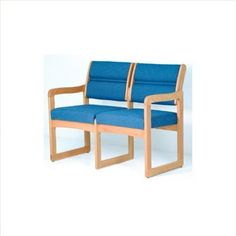 two blue chairs sitting next to each other on top of a white surface with wood frame