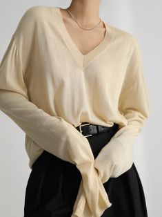 Wool blend knit in silky finish. Long oversized sleeves and deep V-neck. Ribbed neckline. Model is in MINUSEY ONE SIZE. ✔️ Free worldwide express shipping over $100✔️ Loved by 6,500+ customers✔️ Limited edition collections, maximum style⠀⠀⠀⠀⠀⠀⠀⠀⠀Stay ahead of the trend with can’t-find-anywhere-else staples. Your closet will thank you 💕* MINUSEY ONE SIZE = EU 34-38, US 2-6* 40% Wool / 10% Cashmere / 50% Acrylic* Dry clean* Made in Korea - Model Height: 172cm/5'7" (US2, EU34) Beige Long Sleeve V-neck Sweater For Loungewear, Cream V-neck Sweater For Workwear In Fall, Classic Oversized V-neck Sweater, Oversized Beige V-neck Sweater With Long Sleeves, Oversized Beige Long Sleeve V-neck Sweater, Cozy Cream V-neck Long Sleeve Sweater, Beige Long Sleeve V-neck Sweater For Layering, Cozy Cream Long Sleeve V-neck Sweater, Cream V-neck Winter Sweater For Work