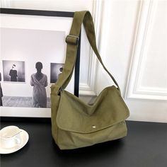 Shoulder bag Size:length 33cm,Width 10cm,Height 22cmThe error is 0-3cm Color:Black White Brown GreenMain Material: Canvas Suitable for the crowd: teenagers, students, office workers, travel If you have any questions, please feel free to contact us, we will help you, wish you a happy shopping. [23y 8m 4d] Mens Satchel, Travel Crossbody, Big Shoulders, Crossbody Bags For Travel, Women Crossbody Bag, Canvas Messenger Bag, Canvas Crossbody Bag, Crossbody Bag Women, Shoulder Messenger Bag