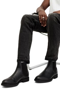 Elevate your closet staples with this sleek leather Chelsea boot featuring Western-inspired paneling at the heel and a rugged rubber sole. 5 1/2" shaft Lace-up style Leather and textile upper and lining/rubber sole Made in Portugal Casual Black Boots With Leather Lining, Classic Ankle-high Chelsea Boots With Leather Sole, Classic Heeled Boots With Rubber Heel Cap, Classic Ankle-high Waterproof Boots With Reinforced Heel, Ankle-high Chelsea Boots With Rubber Sole For Work, Classic Ankle-high Boots For Fall, Casual Chelsea Boots In Calf Leather With Plain Toe, Calf Leather Moc Toe Boots For Fall, Fall Chelsea Boots With Rubber Sole And Plain Toe