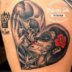 a woman with a skull tattoo on her shoulder and the words thirsty ink tattooed to it