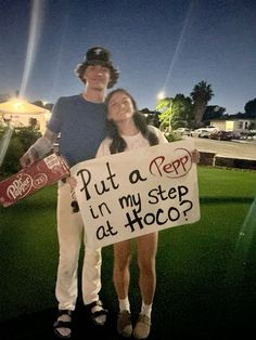 a man and woman holding a sign that says put a pep in my step at hoco?