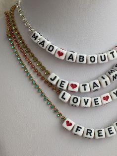 "Fun customized name/words necklace. Wear it with day outfit or nigh outfit and layered with other necklaces. You can order in large quantities for a party/event as special customize gifts. The letters are made out of square plastic beads . Size about 5mm The chain is a crystals✨ Swarovski ✨, comes in 4 colors. Chain width about 1.5mm The Swarovski chain gives sparkling affect and make it unique. Please choose at chain color at Finish menu: Crystal clear - silver tone metal Aqua blue - gold tone Trendy Name Necklace For Mother's Day, Customizable Trendy Necklaces For Personalized Gifts, Trendy Customizable Necklaces For Personalized Gifts, Trendy Customizable Necklace For Personalized Gifts, Trendy White Custom Name Jewelry, Personalized Name Necklace For Parties, White Custom Name Charm Necklaces For Birthday, Customizable Trendy Necklaces For Birthday, Customizable Trendy Necklace For Birthday