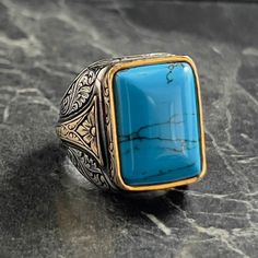 Square Turquoise Blue Gemstone Silver Ring , Genuine Blue Stone Ring , Handmade Flower Patterned Men's Ring , Handmade Jewelry , Gift for Him , Same Day For Shipping ✧ Product Details * Handmade İtem * Gender : Male / Female * Material : 925K Sterling Silver * Ring Weight : 15 Grams * Gemstone Type : Turquoise Blue ✔ Usage Details * Silver jewelry is very sensitive to chemicals. It is recommended to keep away from chemical substances such as cream, bleach, deodorant, detergent. * Silver jewelry can also darken quickly in salt water, that is, in sea water. For this reason, it is best to remove them when swimming in the sea. ✔ Shipping * Your orders placed on weekdays are delivered to the cargo on the same day. Your orders placed on the weekend are delivered to the cargo on Monday. ✔ Other D Handmade Turquoise Rectangular Rings, Rectangular Turquoise Ring Gift, Blue Rectangular Gemstone Rings, Blue Turquoise Ring With Large Stone For Anniversary, Adjustable Blue Rings With Large Stone, Anniversary Blue Turquoise Ring With Large Stone, Blue Rectangular Jewelry With Natural Stones, Rectangular Blue Turquoise Gemstone Ring, Blue Rectangular Natural Stones Jewelry