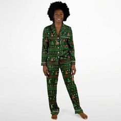 Indulge in the luxury you truly deserve. Treat yourself to a remarkable night's sleep this Holiday Season with our exquisite Christmas Tree African Print satin pajama set, adorned with a captivating Christmas Trees. Crafted to offer unparalleled comfort, these pajamas will have you feeling like royalty as you slip into a tranquil slumber.Experience the unmatched softness of our satin fabric, akin to the gentle touch of butter on your skin. The supple, satiny texture guarantees you'll ascend to c