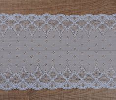 Off-white stretch lace trim with a pretty geometric design. Wide elastic lace with double flounce edges and is excellent quality with a soft handle and drape. This listing is for 1 METER = 1.09 yard width: 8.85 inch = 22.5 cm Ideal for sewing and craft projects. This stretch lace ideal for lingerie, bra making, clothing, accessories, doll dresses, table runner decoration, home textile, gifts, bags decoration, skirt bottoming, home decor and other projects you could imagine. Multiples of 1 meter White Stretch Scalloped Lace, White Scalloped Stretch Lace, Making Clothing, Bra Making, Gifts Bags, Blue Tulle, Doll Dresses, Wedding Lingerie, Chantilly Lace