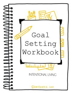 the goal setting workbook with pencils and pens on it, in black and yellow