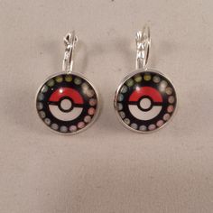 Silver Pokemon Red Pokeball Cabochon Earrings. Brand New And Never Been Worn. These Fine Quality Earrings Are Perfect For All Day, Every Day Wear, Special Occasions, Or A Special Gift. Get An $18 Gift Of Your Choice In My Listings With Purchase Of Two Or More Items. Please Send Offers And Questions. Earrings: Clip Back (Pierced) Weight: 5g Silver Pokemon, Red Pokemon, Pink Stud Earrings, Red Heart Earrings, Cabochon Earrings, Pokemon Red, Bezel Earrings, Bunny Earrings, Pink Studs