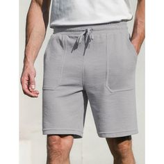 Introducing our Men's Sweat Shorts with Pocket, the perfect combination of style and comfort for your summer wardrobe. These casual waffle shorts feature a relaxed fit, convenient pockets, a drawstring elastic waist, and are ideal for lounging, running, or enjoying outdoor activities during the warmer months. Crafted from high-quality materials, our sweat shorts are designed to provide breathability and flexibility for all-day comfort. The drawstring elastic waist allows for a customizable fit, Gray Athleisure Bottoms For Summer, Gray Bottoms For Leisure Summer Wear, Gray Leisure Athletic Shorts For Summer, Gray Summer Athletic Shorts, Summer Leisure Gray Athletic Shorts, Gray Athletic Shorts With Integrated Liner For Summer, Gray Athletic Shorts With Built-in Shorts For Summer, Gray Relaxed Fit Shorts For Summer, Leisure Gray Shorts With Built-in Liner