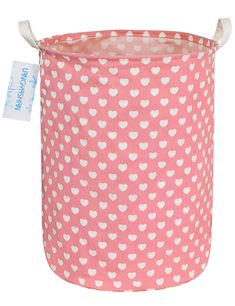 a pink and white polka dot fabric basket with hearts on the front, along with a tag that says cottonwood