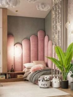 a bedroom decorated in pink and grey with large mirrors on the wall, planters and rugs