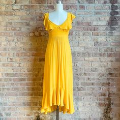 Bnwt Larke X Anthropologie Flutter Maxi Dress In Marigold A Golden Honey Yellow That Looks Great On All Skin Tones- Especially If You're Tan! Flutter Cap Sleeves, Flutter High/Low Hem, Flattering Pleat Detail At Center Front Waist, Hidden Zip With Hook & Eye Closure At Center Back Adjustable Straps For Bodice So Cute Paired With Sandals And A Rattan/Wicker Tote Brand New/Excellent Condition, Flawless. Flowy Yellow Dress With Ruffle Hem, Yellow Ruffle Hem Maxi Dress For Spring, Chic Yellow Midi Dress With Ruffle Hem, Yellow Dress With Ruffle Hem For Brunch, Yellow Ruffled Summer Dress, Yellow Summer Dress With Ruffles, Chic Yellow Maxi Dress With Ruffle Hem, Yellow Midi Dress With Ruffle Hem For Party, Yellow Ruffle Beach Dress