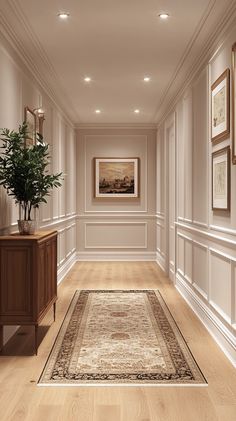 the hallway is clean and ready for guests to use it as an entrance way in this home