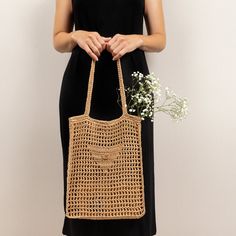 The Raffia shoulder bag is made of high-quality natural raffia and will become your perfect accessory for warm summer days.  Bag characteristics: Height: 35 cm/14 in width: 30 cm/12 in depth: 9 cm/3,5 in Long handles on the shoulder: 56 cm/22 in Raffia is an environmentally friendly raw material. This is 100% natural cellulose for the production of which fibers of palm leaves are used.   *Raffia is strong and elastic, it holds its shape and volume well, so products made of it can be folded and b Rectangular Open Weave Bucket Bag, Beige Crochet Bag With Woven Leather, Chic Natural Woven Shoulder Bag, Woven Jute Shoulder Bag, Chic Woven Leather Shoulder Bag, Natural Color Crochet Bag With Woven Leather, Natural Colored Crochet Bag With Woven Leather, Crochet Jute Tote Bag With Woven Leather, Eco-friendly Crochet Bag With Woven Leather Details