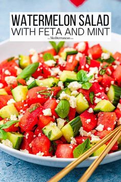 watermelon salad with feta and mint in a white bowl with chopsticks