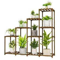 a set of six plant stands with plants on each shelf and one in the middle