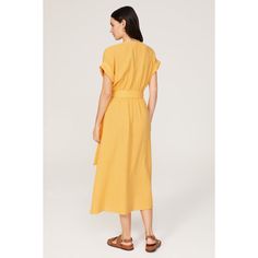 Yellow cotton (100% Cotton). Wrap. Short sleeves. V-neck. Tie closure. 50.5" from shoulder to hemline. Imported. Relaxed Fit V-neck Dress With Tie Waist, V-neck Maxi Dress For Daytime, Cotton Belted Dress For Day Out, Spring Cotton V-neck Dress With Short Sleeves, Cotton Relaxed Fit Belted Dress, Relaxed Fit Belted Cotton Dress, Chic V-neck Maxi Dress For Daytime, Casual V-neck Midi Dress With Tie Waist, Summer V-neck Workwear Dress