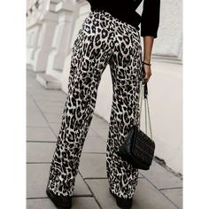 Show your wild side with these animal print pants. Choose from either leopard or zebra print. Not only are they cute but they are also functional, because they have convenient pockets! Animal Print Pants Key Features Opaque fabric Elastic waist Zebra or Leopard print Pocketed US sizes 2-14 are the equivalent of their S to 3X, which is different than standard US sizes, please use size chart below before ordering Care instructions: Machine wash cold. Tumble dry low. Ship from overseas, made by LTH Animal Print Pants, Outerwear Outfit, Print Pants, Leopard Animal, Elastic Waist Pants, Sweaters And Jeans, Sweater Pants, Printed Pants, Waist Pants