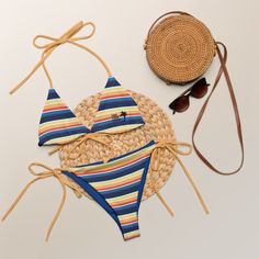 Stay comfortable and beach ready all summer in this FYC String Bikini set. It’s made from soft recycled polyester with double-layering and UPF 50+. Style the straps how you like, and get ready to swim! 🏊‍♀️ 🌟 Features: Soft and stretchy material with UPF 50+ protection. Available in sizes up to 4XL. Bikini top comes with removable padding for comfort. Multiple ways to tie and style the bikini set. 🌊 Disclaimer: To make your All-Over Print Recycled String Bikini last longer, thoroughly rinse i 50 Style, Beach Ready, Upf 50, Stretchy Material, String Bikinis, Layering, Recycling, Finding Yourself, Make It Yourself