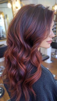 Dark Brown Hair with Burgundy Highlights creates a stunning contrast that adds vibrancy and depth to your look. This eye-catching combination enhances the richness of dark brown while providing a touch of bold flair. Click the pin to discover more fabulous ideas and follow us for the latest hair trends! #DarkBrownHair #BurgundyHighlights #HairColor #Brunette #ColorInspo Brunette With Mahogany Highlights, Fall Red Hair Color For Brunettes, Highlights For Burgundy Hair, Unique Hair Colour Ideas, Maroon Highlights On Brown Hair, Dark Brown Hair With Burgundy, Chocolate Cherry Hair Color With Highlights, Brown Hair With Red Tips, Brown Hair With Burgundy