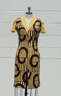 A modern take on classic style using African fabric.  The fabric is 100% cotton and we will create a custom dress with your supplied measurements. Fitted Cotton V-neck Mini Dress, Vintage Fitted V-neck Midi Dress, Cotton Short Sleeve Dress For Casual Wear, Semi-formal Fitted Knee-length Mini Dress, Fitted Cotton Knee-length Mini Dress, Fitted Knee-length Cotton Mini Dress, Fitted Knee-length Mini Dress For Semi-formal Occasions, Elegant Formal Cotton Mini Dress, Elegant Cotton Mini Dress For Formal Occasions