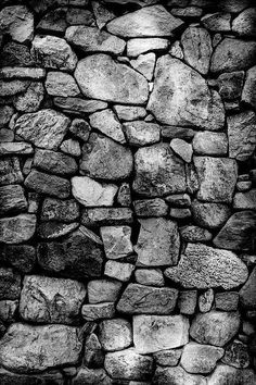 black and white photograph of a stone wall