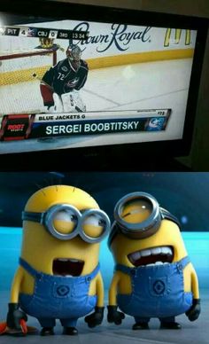 two minion characters standing next to each other in front of a tv with the caption's name on it