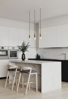 a kitchen with marble counter tops and stools in front of an island that has three lights hanging from it