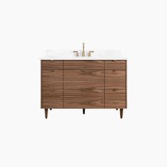 an image of a bathroom vanity with two sinks on it's sides and wood legs