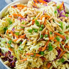 a bowl filled with coleslaw and carrots