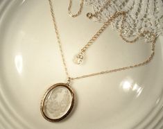 "Offering a beyond EXQUISITE vintage Art Nouveau/Edwardian clear intaglio floral camphor glass pendant necklace. The perfect \"Something Old\" for the Bride or with a sweater and jeans! It's so tough to find these vintage intaglio jewels and this one is gorgeous! The ornate embossed gold tone setting is bezel set with a very detailed cut glass crystal intaglio. The beautiful flower design just glows as it catches the light. I love the elegant design of this high quality jewel. When I found this Antique Crystal Necklaces For Wedding, Antique Crystal Wedding Necklaces, Antique Wedding Necklaces With Jewels, Vintage Cameo Jewelry For Wedding, Vintage Clear Necklace For Wedding, Vintage Crystal Necklaces For Weddings, Vintage Jeweled Necklaces For Wedding, Elegant Oval Cameo Necklace For Wedding, Elegant Vintage Charm Necklaces For Wedding