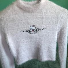 Hello Kitty Long Sleeve Top. Super Cute Top Cropped Style From Bershka. Worn Just To Try On Is A Size Medium But Runs Small. Would Probably Fit A Person Who Is A Size Xs Or Xxs. Size: Xs & Xxs Measurements Taken Flat: Pit To Pit - 14in” Length - 14 1/2 In” Cat Friendly & Smoke Free Home Offers Welcome! Kawaii Softgrunge Balletcore Softgoth Dollcore Cutecore Hellokitty Pink Fuzzy Pastelcore Kidcore Emo Egirl Rhinestone Hello Kitty Top, Hello Kitty Crew Neck Top, Fitted Hello Kitty Crew Neck Top, Cute Cat Design Tops For Winter, Cute Cat Design Winter Tops, Cute Cat Design Top For Winter, Cute Winter Tops With Cat Design, Fitted Kawaii Tops With Hello Kitty Print, Fitted Hello Kitty Print Kawaii Tops