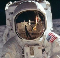 an astronaut standing on the moon in space