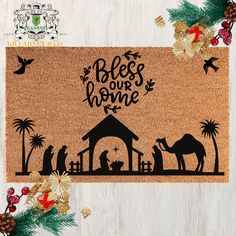 a nativity scene door mat with the words, jesus our home and three wise men