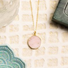 Pink Opal circle necklace on 14k dainty gold filled chain - Minimalist Jewelry gifts for her, mom, wife, daughter - Pink and gold gemstones Stone: Genuine Pink Opal Stone: 20mm diameter Gold chain: 14k gold filled Chain length: 18 inches Clasp: spring ring Made in the USA About "Gold Filled Jewelry": Also called rolled-gold. These jewelry items are not actually filled with gold. They are made of a base metal covered by sheets of gold in a mechanical bonding process. Effectively a thick coat of g Thick Coat, Opal Stone, Circle Necklace, Pink Opal, Gold Filled Jewelry, Gold Pendant Necklace, Gold Filled Chain, Minimalist Jewelry, Base Metal