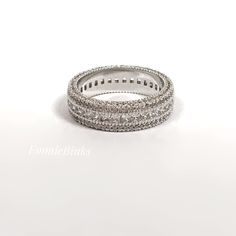 Stunning 18kgp (White Gold) 3 Row Cubic Zirconia Eternity Band Filled With Horizontal Pave Cubic Zirconia Stones! Stones Cut In Both Round & Emerald Cut~ Light Reflects From Various Angles~ Fits Size 9 0.4” Wide New / Nwot 18 Karat White Gold Plated Brass / Cubic Zirconia Stones Imported New Sale Price With Discounted Shipping ~ ~ ~ ~ ~ ~ ~ ~ Got A Few Minutes? Don’t Hesitate To Head Over To My Page Where You’ll Find Over 100 Jewelry Items! White Cubic Zirconia Diamond Ring For Promise, White Cubic Zirconia Round Cut Eternity Band, White Cubic Zirconia Eternity Band With Round Cut, White Round Cut Cubic Zirconia Eternity Band, Elegant Iced Out Diamond Ring For Anniversary, Diamond White Cubic Zirconia Ring Iced Out, Anniversary Cubic Zirconia Iced Out Diamond Ring, Iced Out Cubic Zirconia Ring In Diamond White, Iced Out Cubic Zirconia Diamond Ring For Anniversary