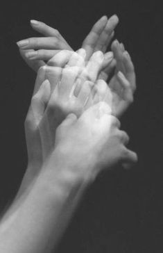 two hands reaching up towards each other with the words awesome god above them in black and white