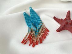 Turquoise/red earrings Native beaded earrings Dangle Fringe | Etsy Turquoise Beaded Tassel Earrings For Gifts, Turquoise Tassel Earrings With Dangling Beads For Gifts, Red Tassel Earrings With Round Beads As Gift, Unique Beaded Fringe Jewelry As Gift, Unique Beaded Fringe Jewelry For Gift, Turquoise Beaded Fringe Jewelry Gift, Turquoise Jewelry With Beaded Fringe For Gifts, Turquoise Tassel Earrings With Colorful Beads As Gift, Beaded Tassel Dangle Earrings For Gift