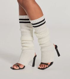 Stay trending in these sporty chic striped leg warmers to keep cozy all winter season. Pair with heels or boots.Fit & FeaturesRibbed knit leg warmersAthletic stripe designCalf-length fit Fashion tape, adhesive bras, adhesive panties, pasties, cosmetics, and lingerie are considered final sale merchandise. FINAL SALE and CLEARANCE merchandise may not be returned or exchanged. White Sporty Socks For Winter, White Sporty Winter Socks, Winter Striped Socks, Knee-high Striped Winter Socks, Striped Knee-high Winter Socks, Stretch Striped Socks For Winter, Striped Stretch Socks For Winter, Winter Striped Stretch Socks, Sporty Stretch Leg Warmers For Winter